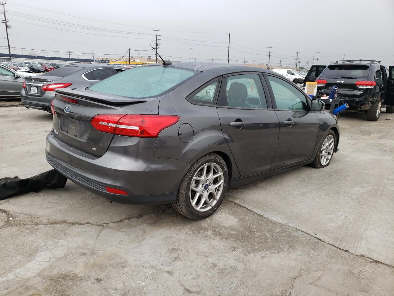 Photo 4 from auction – 2015 FORD FOCUS SE with VIN 1FADP3F20FL306622