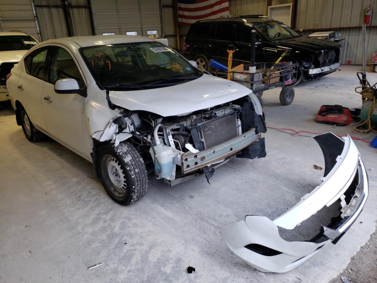 NISSAN VERSA S 2014 with VIN 3N1CN7AP2EL856609 - Photo from auction