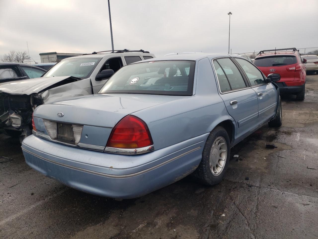 Photo 4 from auction – 2000 FORD CROWN VICT with VIN 2FAFP74W1YX134905