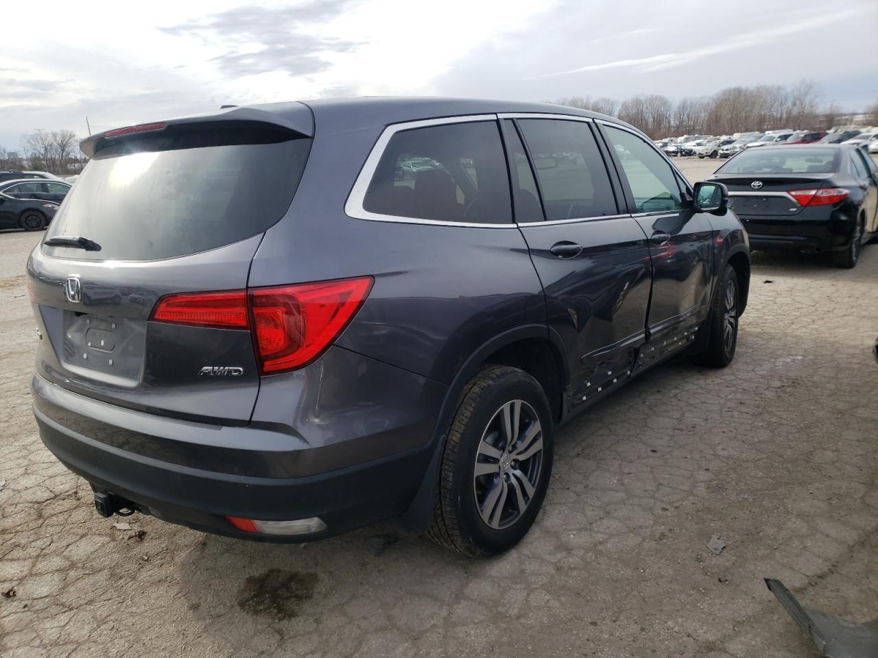 Photo 4 from auction – 2017 HONDA PILOT EXL with VIN 5FNYF6H84HB069849