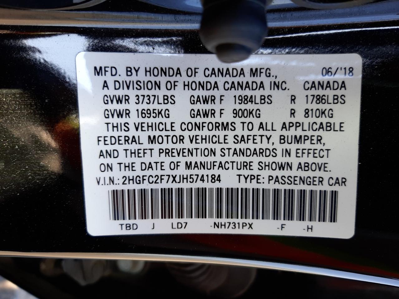 Photo 10 from auction – 2018 HONDA CIVIC EX with VIN 2HGFC2F7XJH574184
