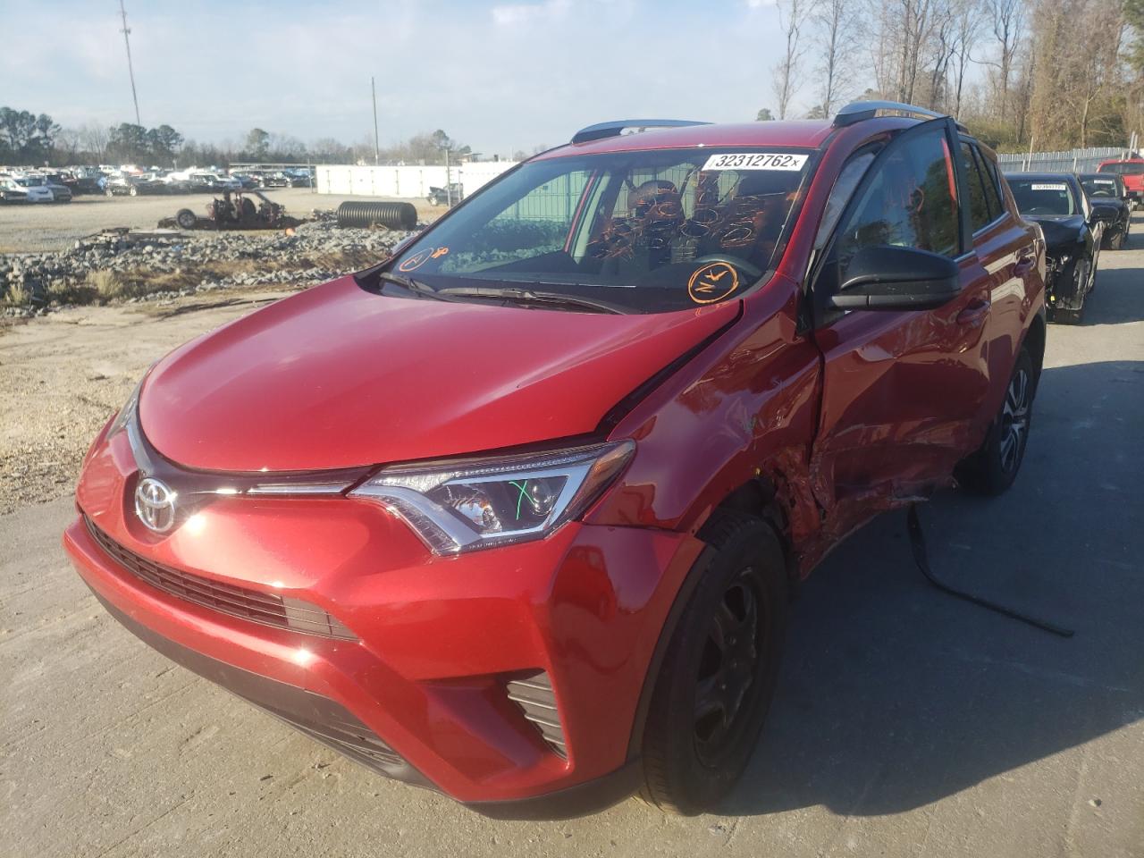 Photo 2 from auction – 2016 TOYOTA RAV4 LE with VIN 2T3ZFREV0GW310055