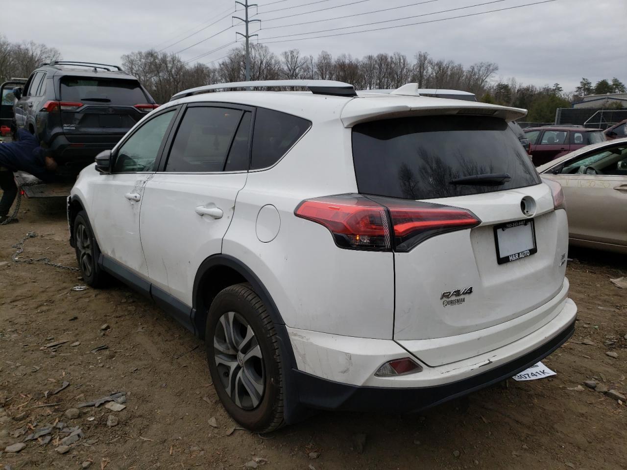 Photo 3 from auction – 2016 TOYOTA RAV4 LE with VIN 2T3BFREV9GW506061