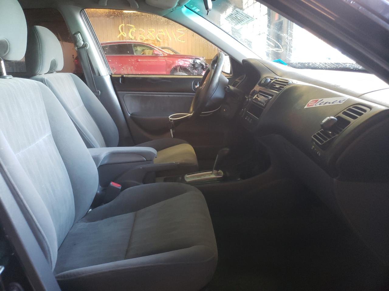 Photo 5 from auction – 2004 HONDA CIVIC LX with VIN 2HGES165X4H579705