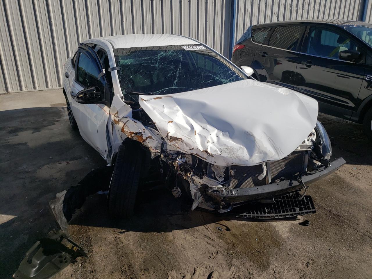 TOYOTA COROLLA L 2018 with VIN 5YFBURHE3JP789608 - Photo from auction