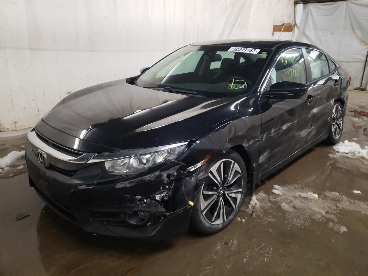 Photo 2 from auction – 2016 HONDA CIVIC EXL with VIN 2HGFC1F72GH630766