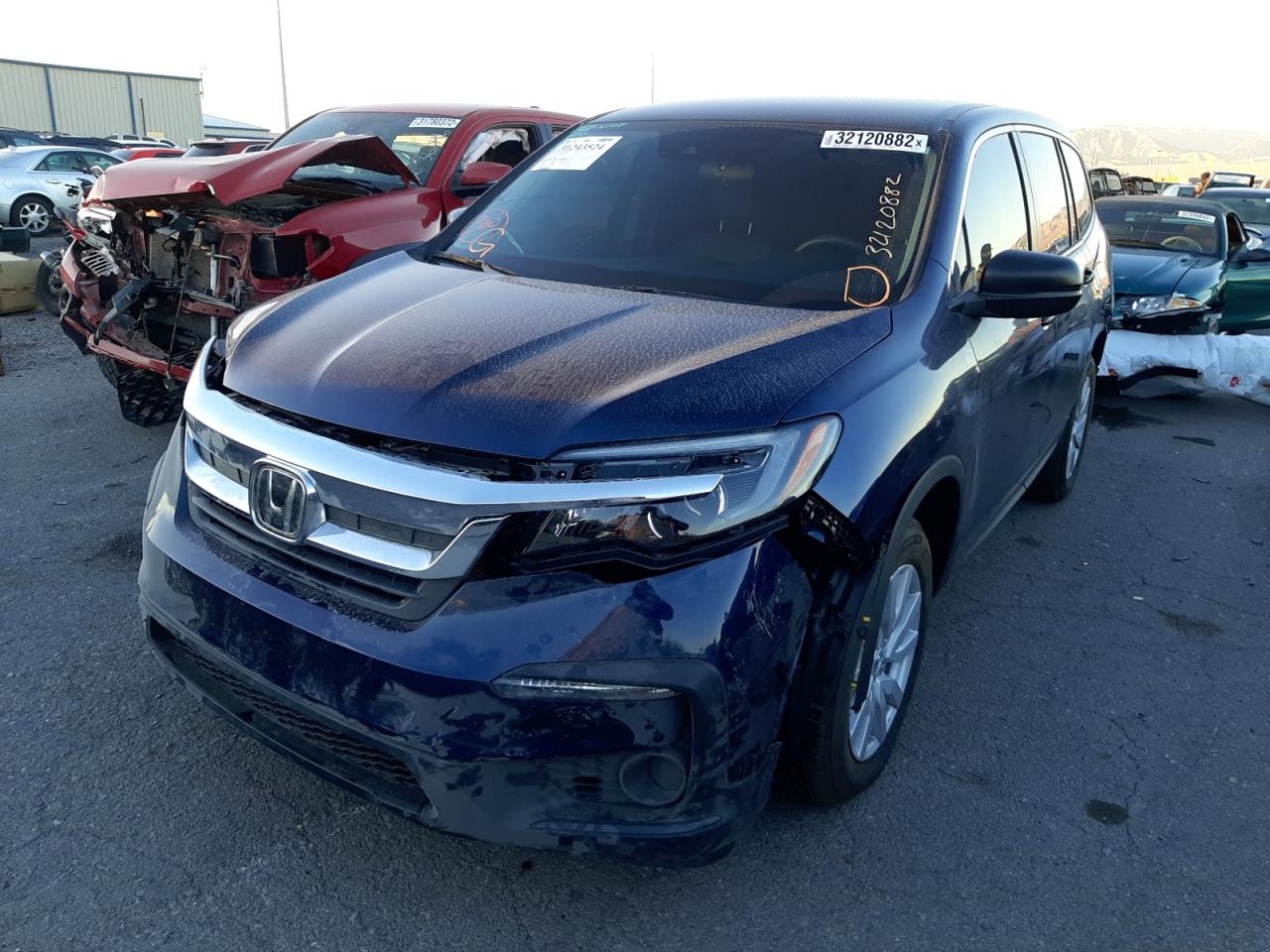 Photo 2 from auction – 2019 HONDA PILOT LX with VIN 5FNYF5H10KB044483