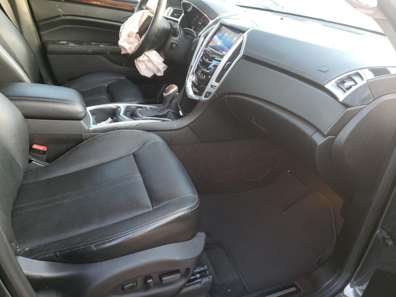 Photo 5 from auction – 2014 CADILLAC SRX LUXURY with VIN 3GYFNEE30ES570439