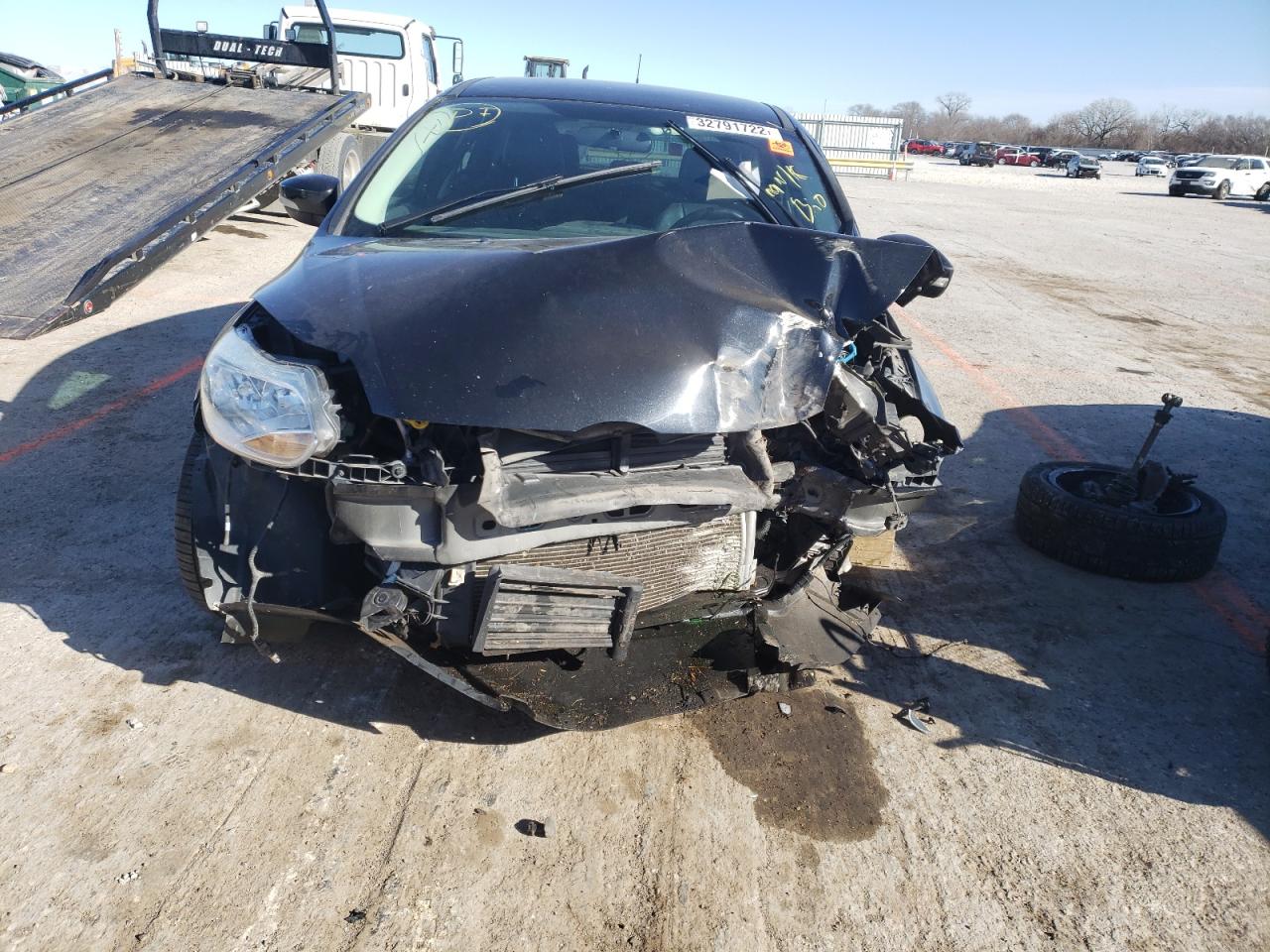 Photo 9 from auction – 2014 FORD FOCUS SE with VIN 1FADP3K21EL355140