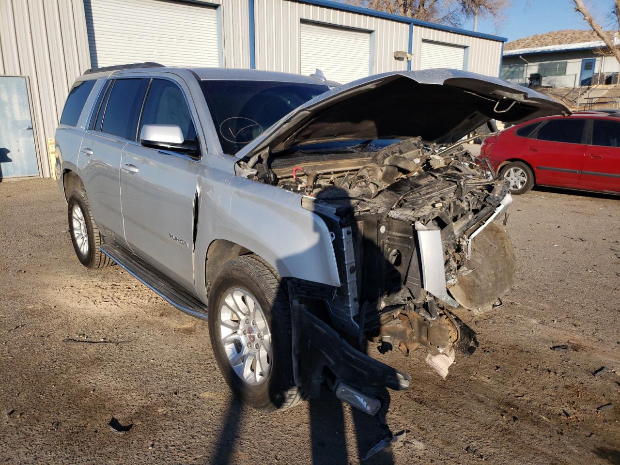 GMC YUKON SLE 2016 with VIN 1GKS2AKC1GR322415 - Photo from auction