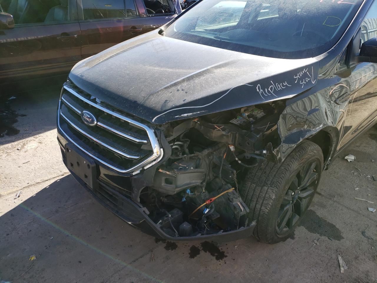 Photo 9 from auction – 2018 FORD ESCAPE SE with VIN 1FMCU9GD1JUC47838