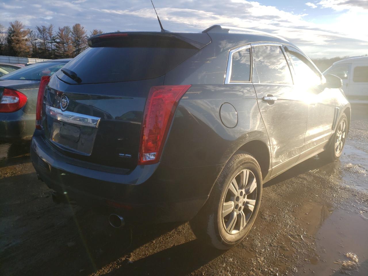 Photo 4 from auction – 2014 CADILLAC SRX LUXURY with VIN 3GYFNEE30ES570439