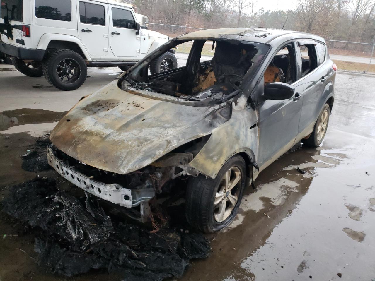 Photo 2 from auction – 2013 FORD ESCAPE SE with VIN 1FMCU0GX3DUD07211