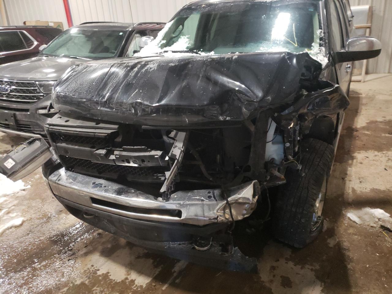 Photo 9 from auction – 2011 CHEVROLET SILVERADO with VIN 1GCRKSE39BZ300988
