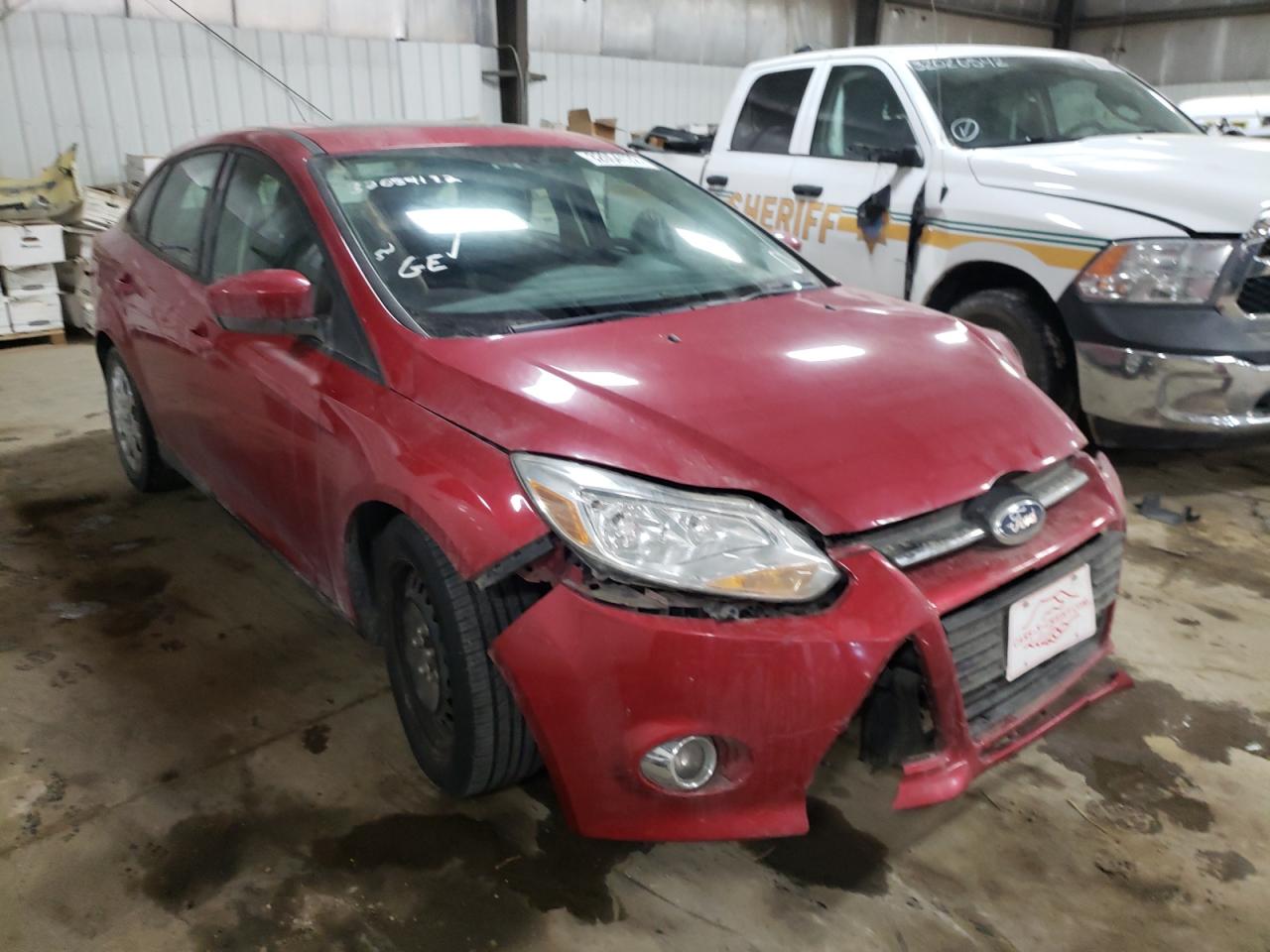 FORD FOCUS SE 2012 with VIN 1FAHP3F24CL323338 - Photo from auction