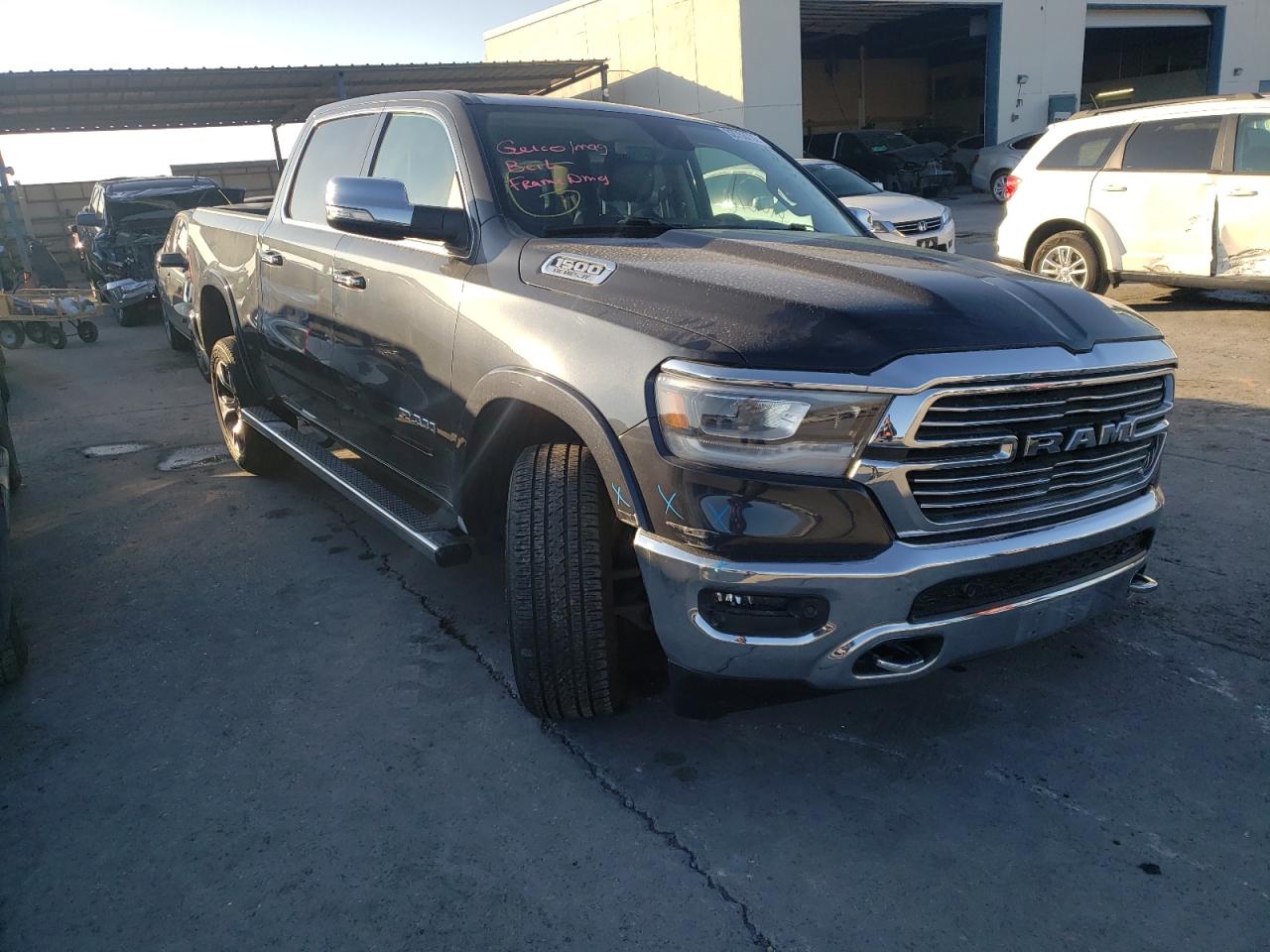 RAM 1500 LARAM 2019 with VIN 1C6SRFJT1KN878432 - Photo from auction