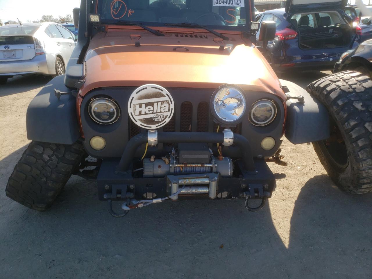 Photo 9 from auction – 2010 JEEP WRANGLER U with VIN 1J4BA6H14AL220483