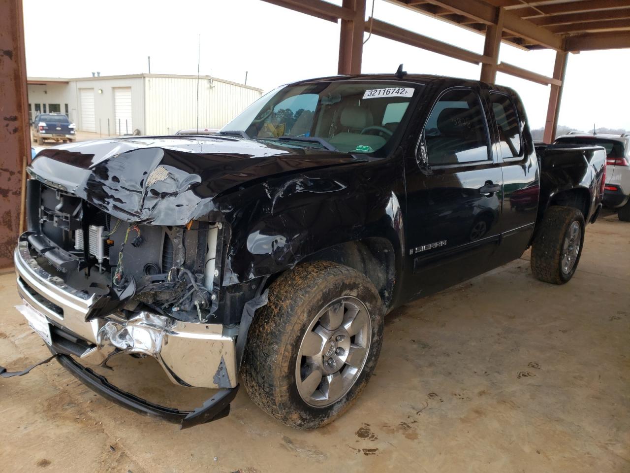 Photo 2 from auction – 2009 GMC SIERRA K15 with VIN 2GTEK290191128389