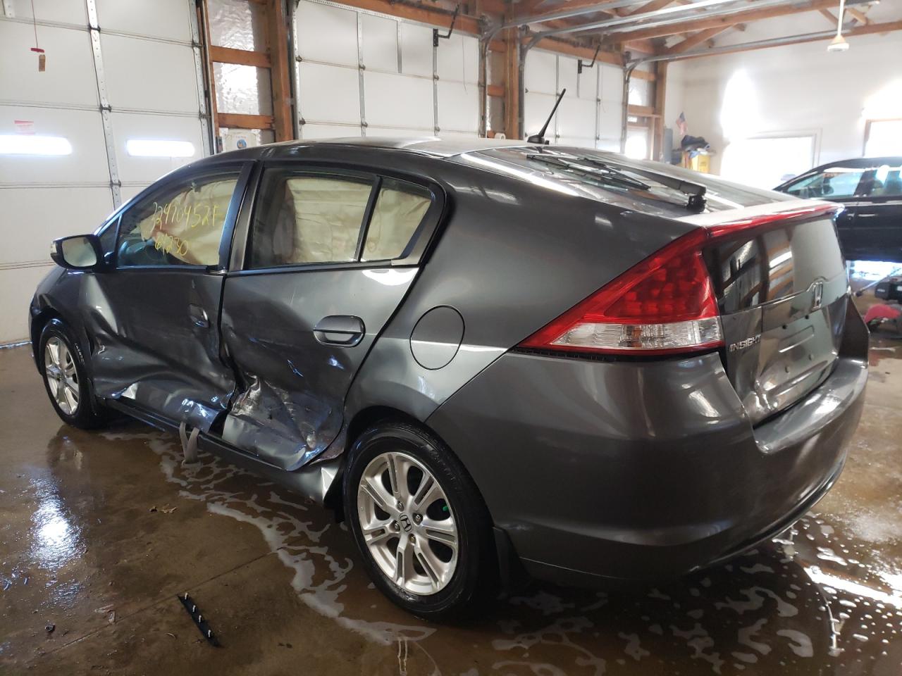 Photo 3 from auction – 2010 HONDA INSIGHT EX with VIN JHMZE2H76AS026001