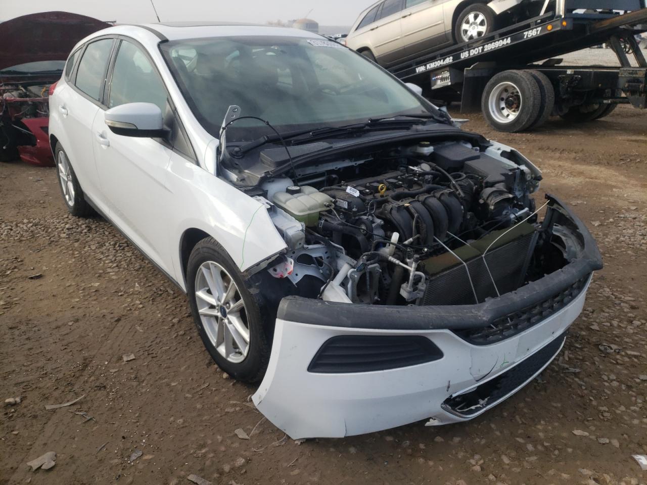 FORD FOCUS SE 2016 with VIN 1FADP3K27GL352021 - Photo from auction