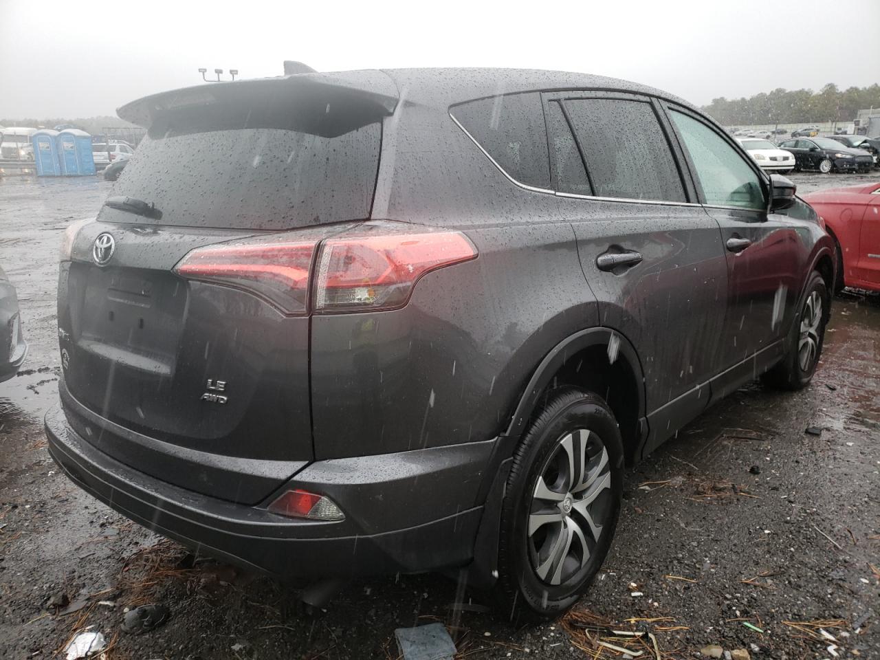 Photo 4 from auction – 2018 TOYOTA RAV4 LE with VIN JTMBFREV0JJ721124