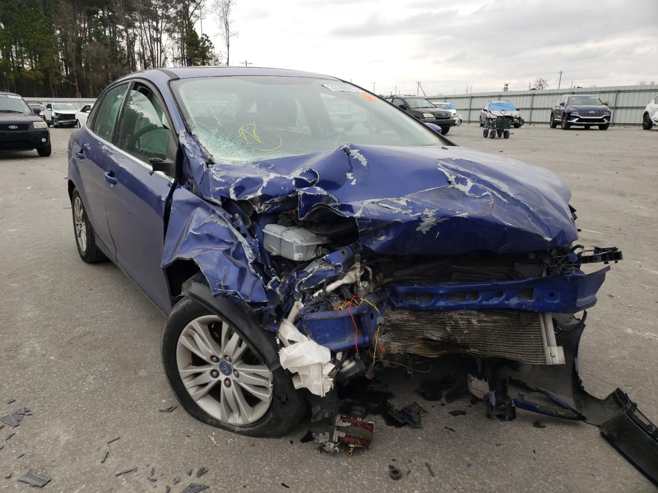 FORD FOCUS SEL 2012 with VIN 1FAHP3H22CL282107 - Photo from auction