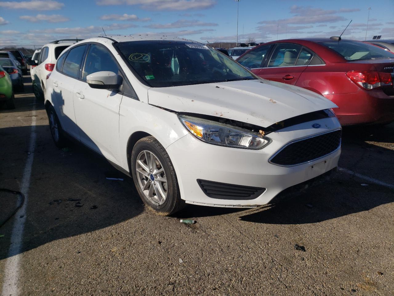 FORD FOCUS SE 2015 with VIN 1FADP3K25FL288706 - Photo from auction