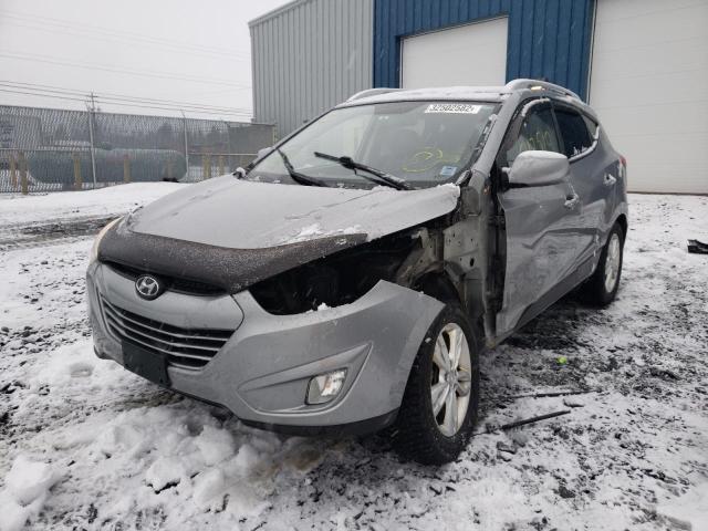 Photo 2 from auction – 2011 HYUNDAI TUCSON GLS with VIN KM8JUCAC2BU166997