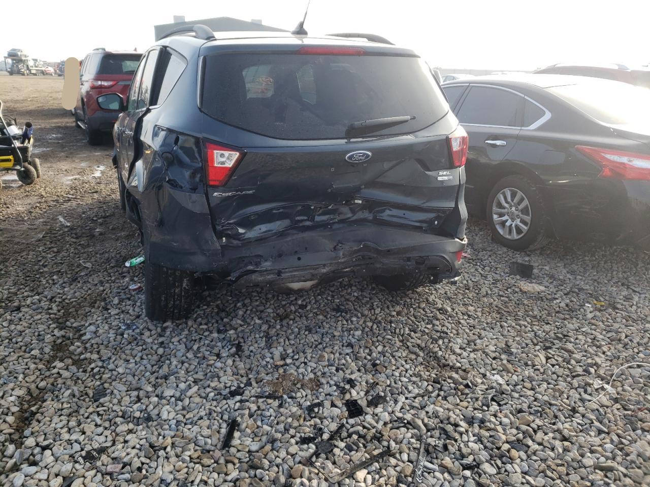 Photo 9 from auction – 2019 FORD ESCAPE SEL with VIN 1FMCU9HD3KUC09950