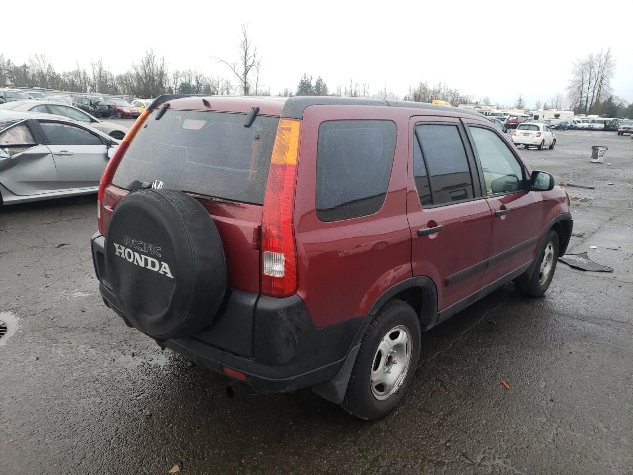 Photo 4 from auction – 2002 HONDA CR-V LX with VIN JHLRD68452C011117