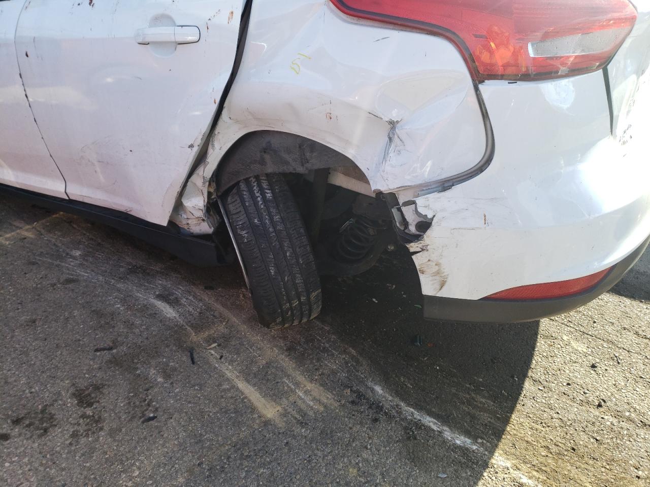 Photo 9 from auction – 2015 FORD FOCUS SE with VIN 1FADP3K25FL288706