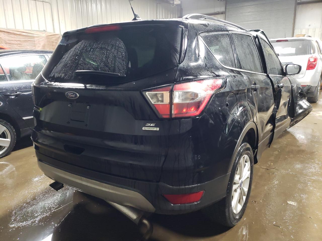Photo 4 from auction – 2018 FORD ESCAPE with VIN 1FMCU0GD9JUD02743
