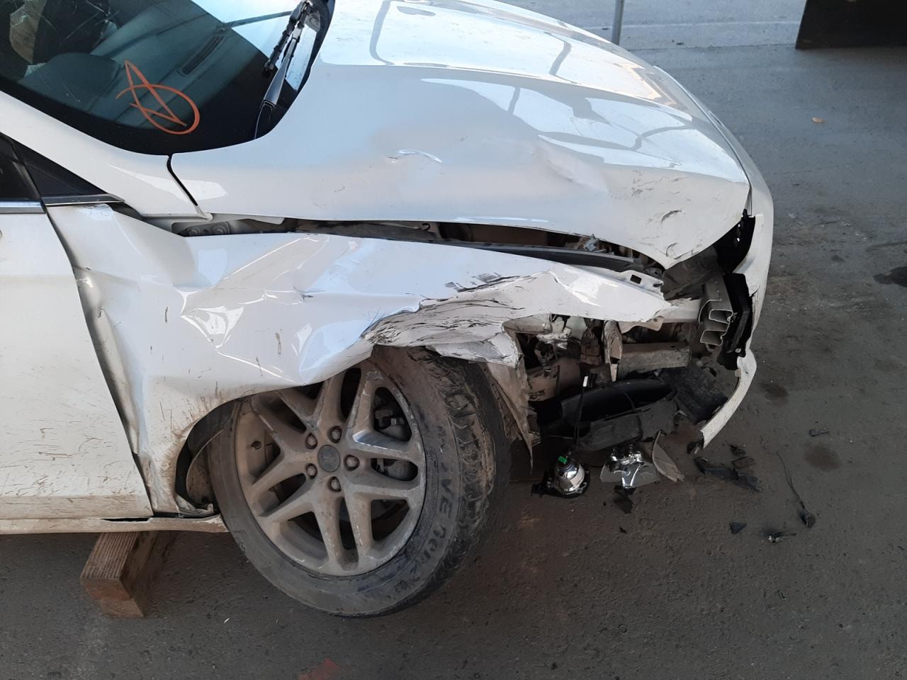 Photo 9 from auction – 2015 FORD FUSION SE with VIN 3FA6P0H71FR115390