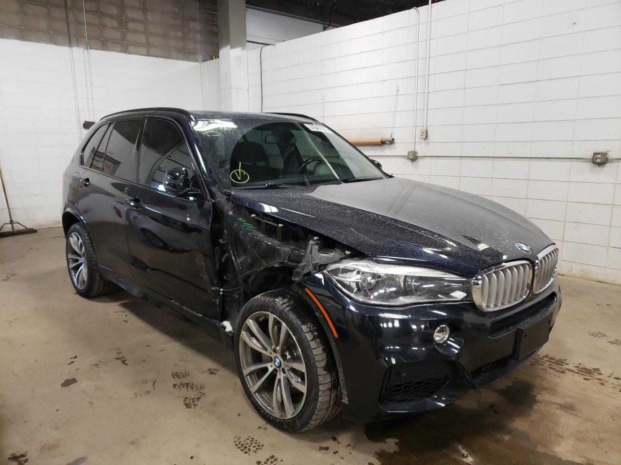 BMW X5 2016 with VIN 5UXKR6C50G0J79724 - Photo from auction
