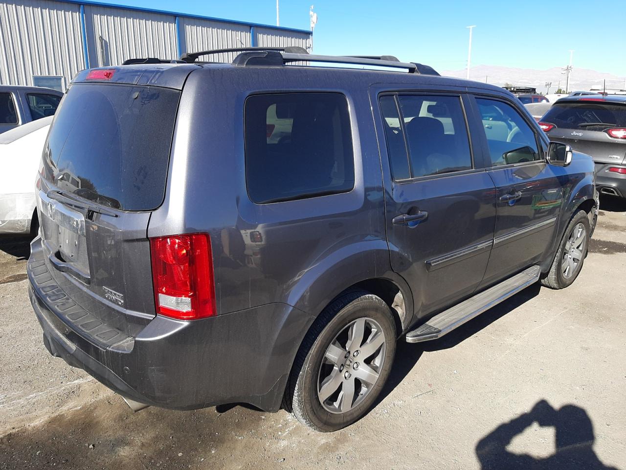 Photo 4 from auction – 2014 HONDA PILOT TOUR with VIN 5FNYF4H91EB030998