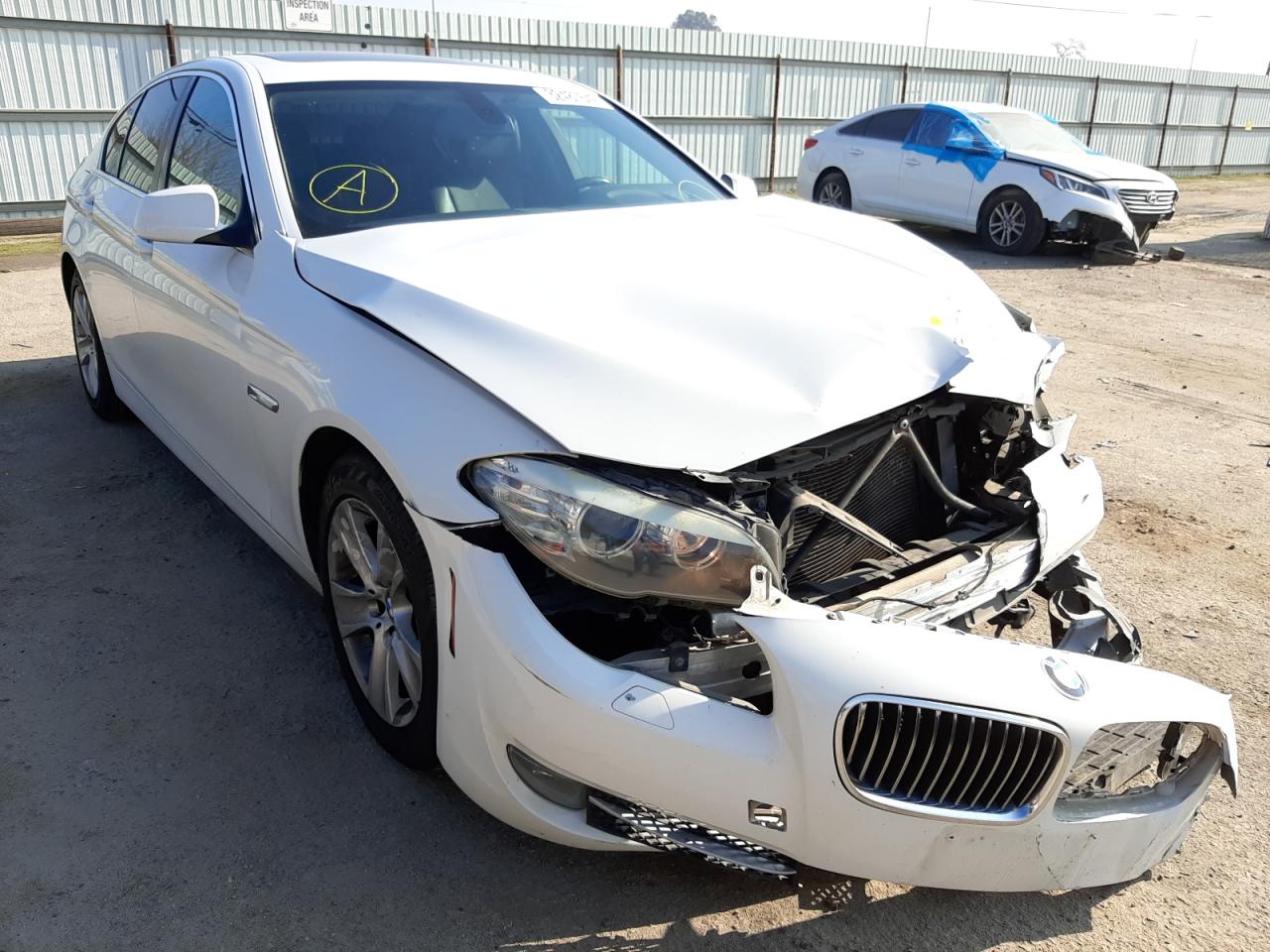 BMW 528 I 2011 with VIN WBAFR1C56BC748022 - Photo from auction