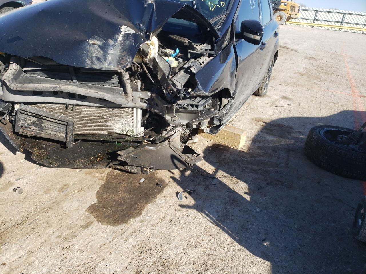 Photo 10 from auction – 2014 FORD FOCUS SE with VIN 1FADP3K21EL355140