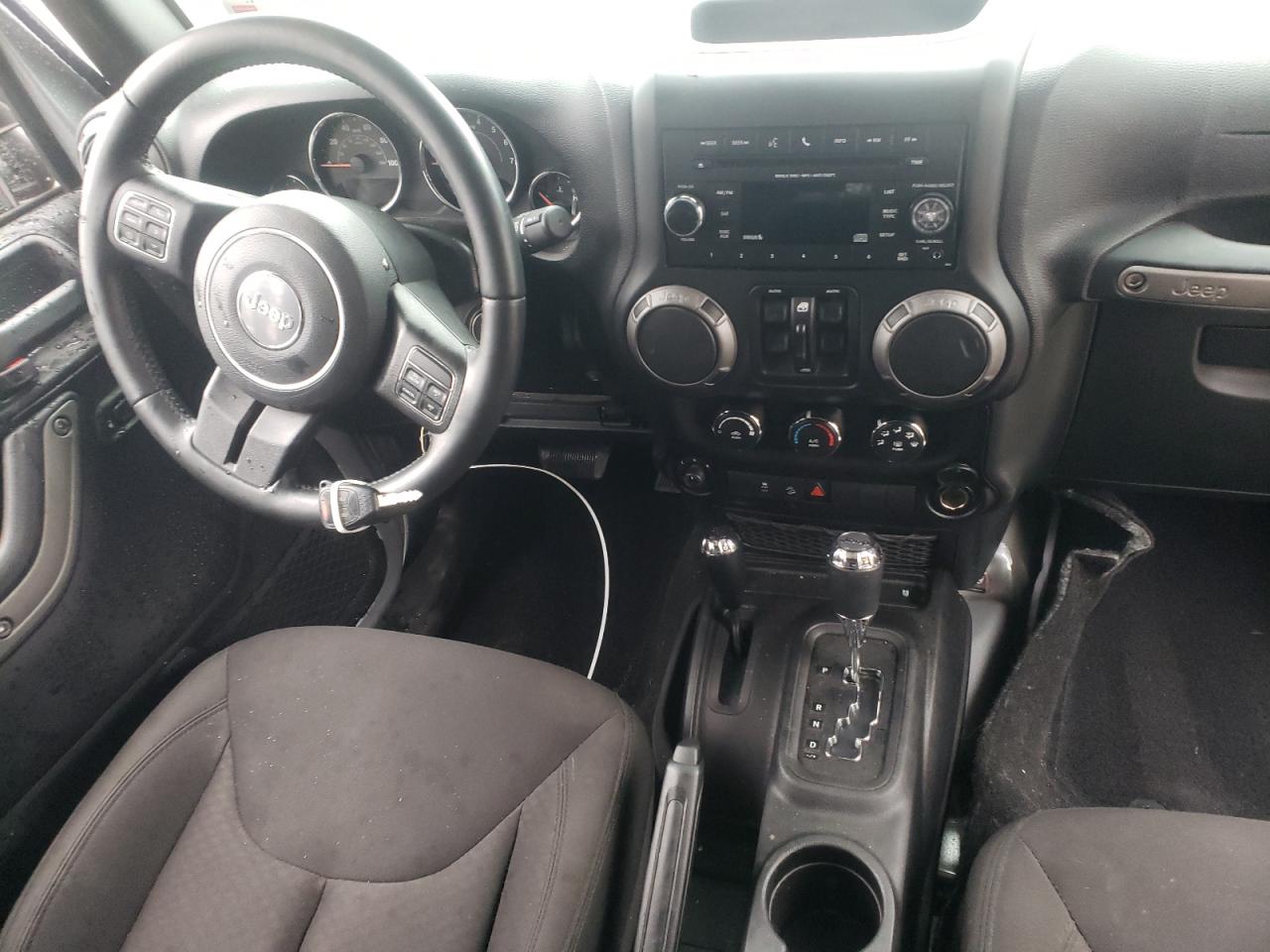 Photo 9 from auction – 2015 JEEP WRANGLER U with VIN 1C4BJWDG7FL759445