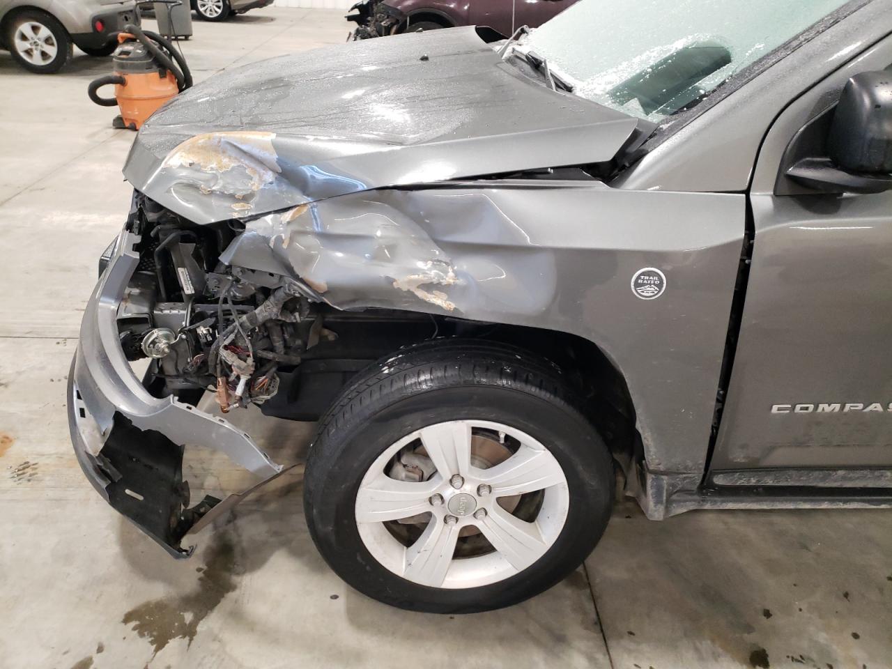 Photo 9 from auction – 2012 JEEP COMPASS LA with VIN 1C4NJDEB2CD554979