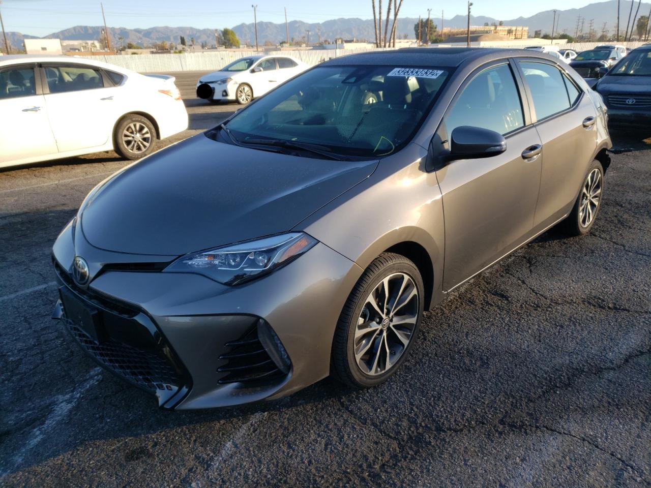 Photo 2 from auction – 2019 TOYOTA COROLLA L with VIN 2T1BURHE7KC129606