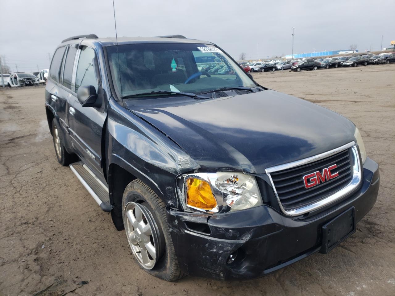 GMC ENVOY 2004 with VIN 1GKDT13S942306480 - Photo from auction
