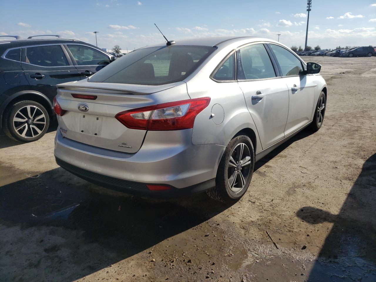 Photo 4 from auction – 2014 FORD FOCUS SE with VIN 1FADP3F28EL208629