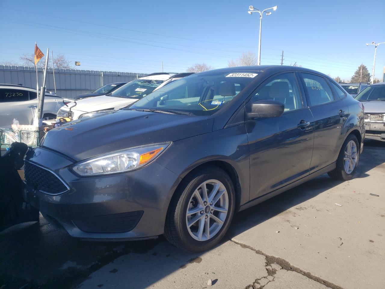 Photo 2 from auction – 2018 FORD FOCUS SE with VIN 1FADP3F26JL216495