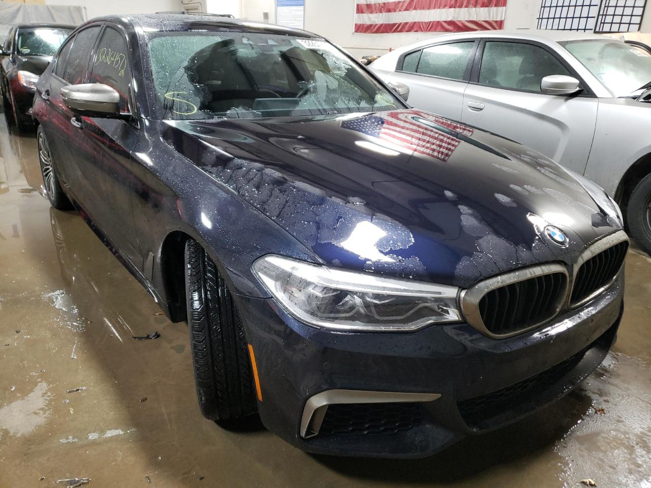 BMW M550XI 2018 with VIN WBAJB9C54JB049912 - Photo from auction