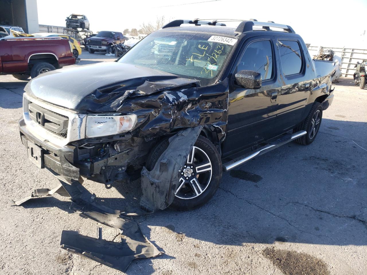 Photo 2 from auction – 2011 HONDA RIDGELINE with VIN 5FPYK1F58BB452781