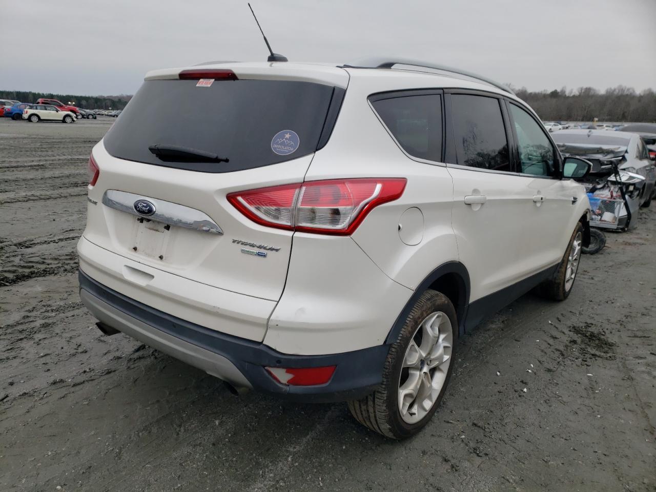 Photo 4 from auction – 2014 FORD ESCAPE TIT with VIN 1FMCU9J95EUB21959