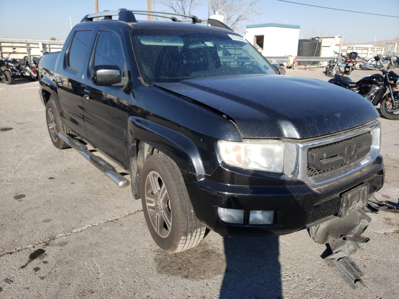 HONDA RIDGELINE 2011 with VIN 5FPYK1F58BB452781 - Photo from auction