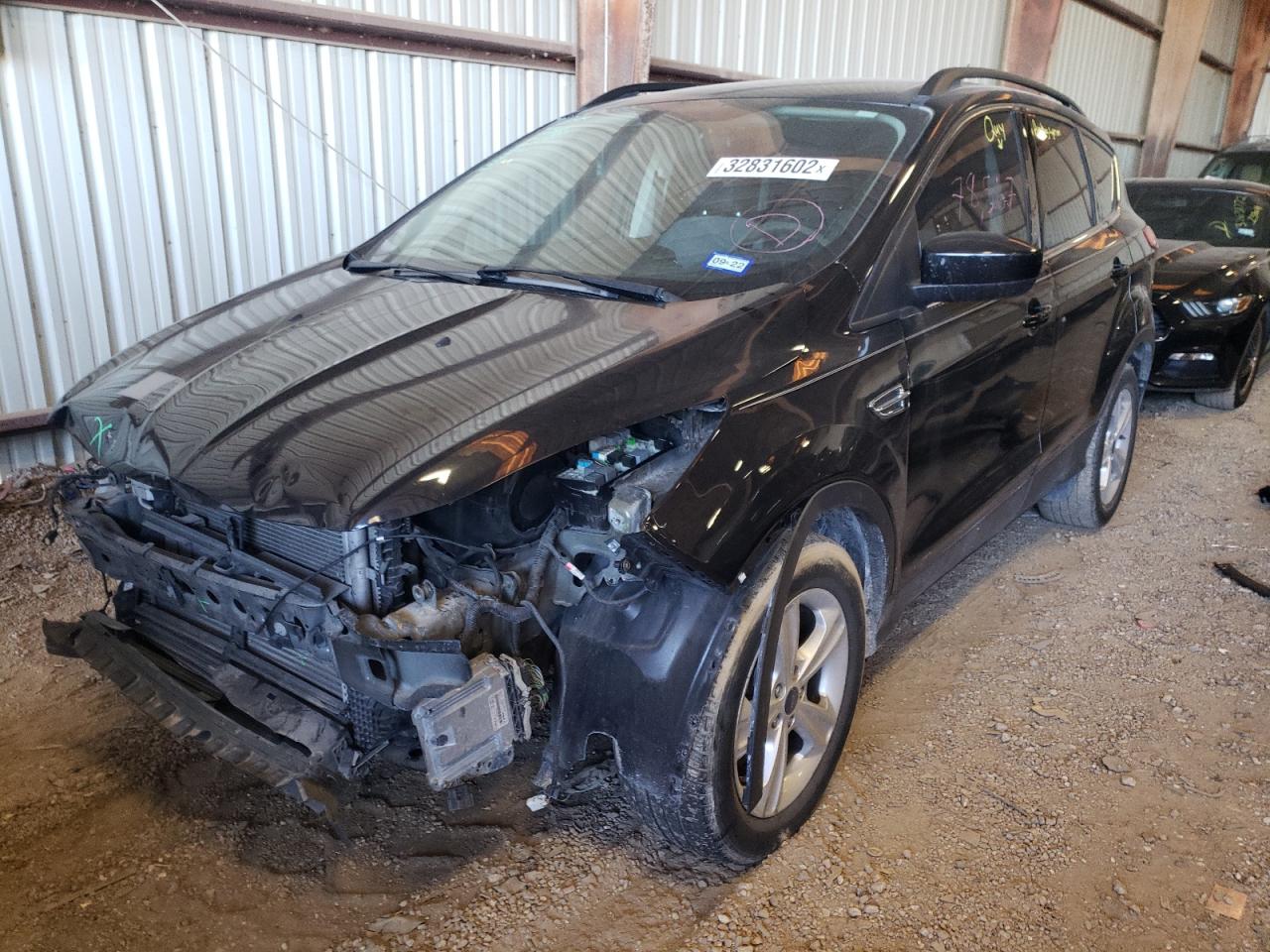 Photo 2 from auction – 2014 FORD ESCAPE SE with VIN 1FMCU0GX9EUD57855