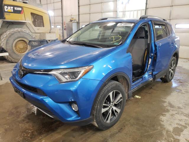 Photo 2 from auction – 2017 TOYOTA RAV4 XLE with VIN JTMRFREV5HJ714095