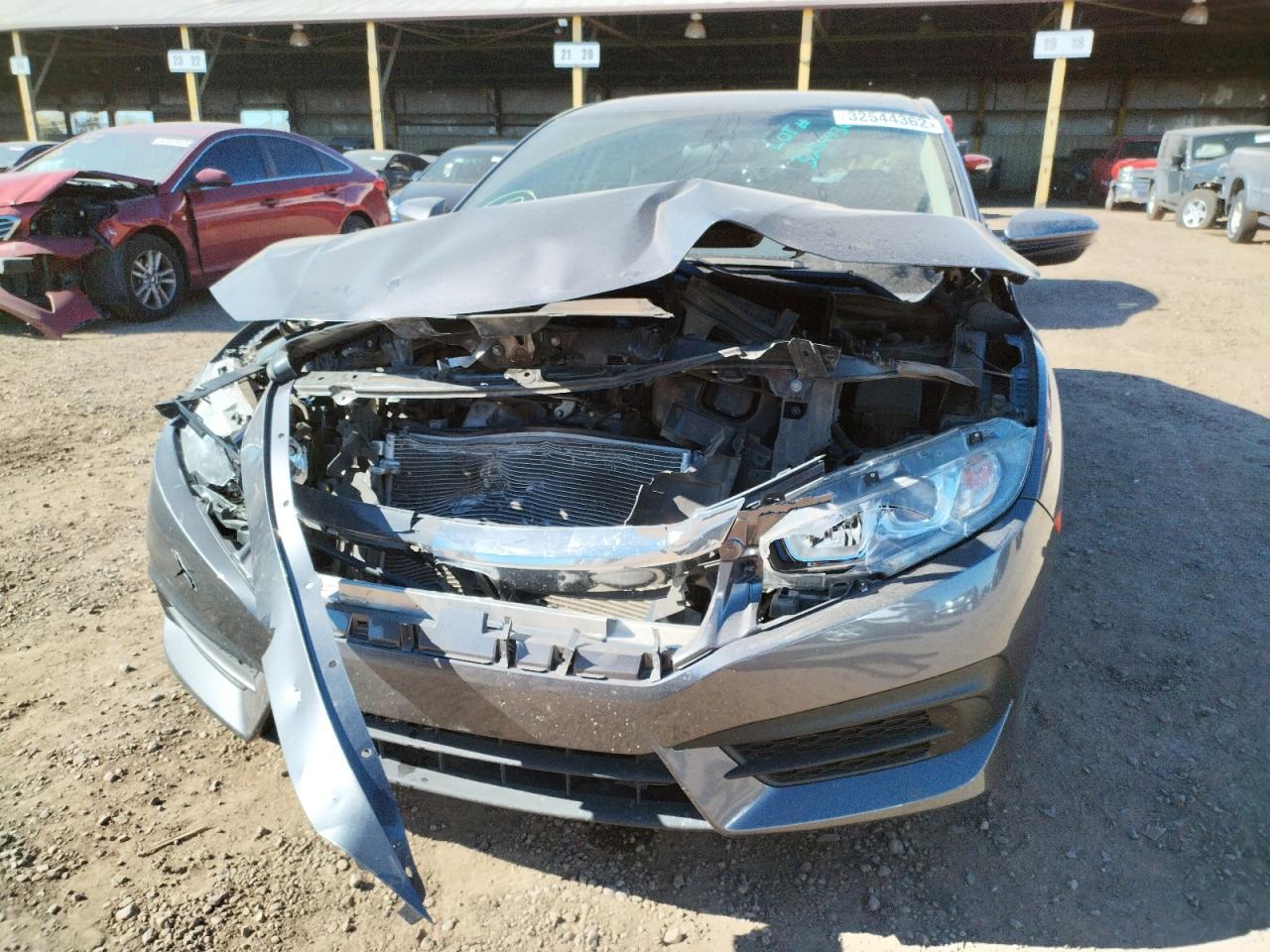 Photo 9 from auction – 2018 HONDA CIVIC EX with VIN 2HGFC2F78JH575642